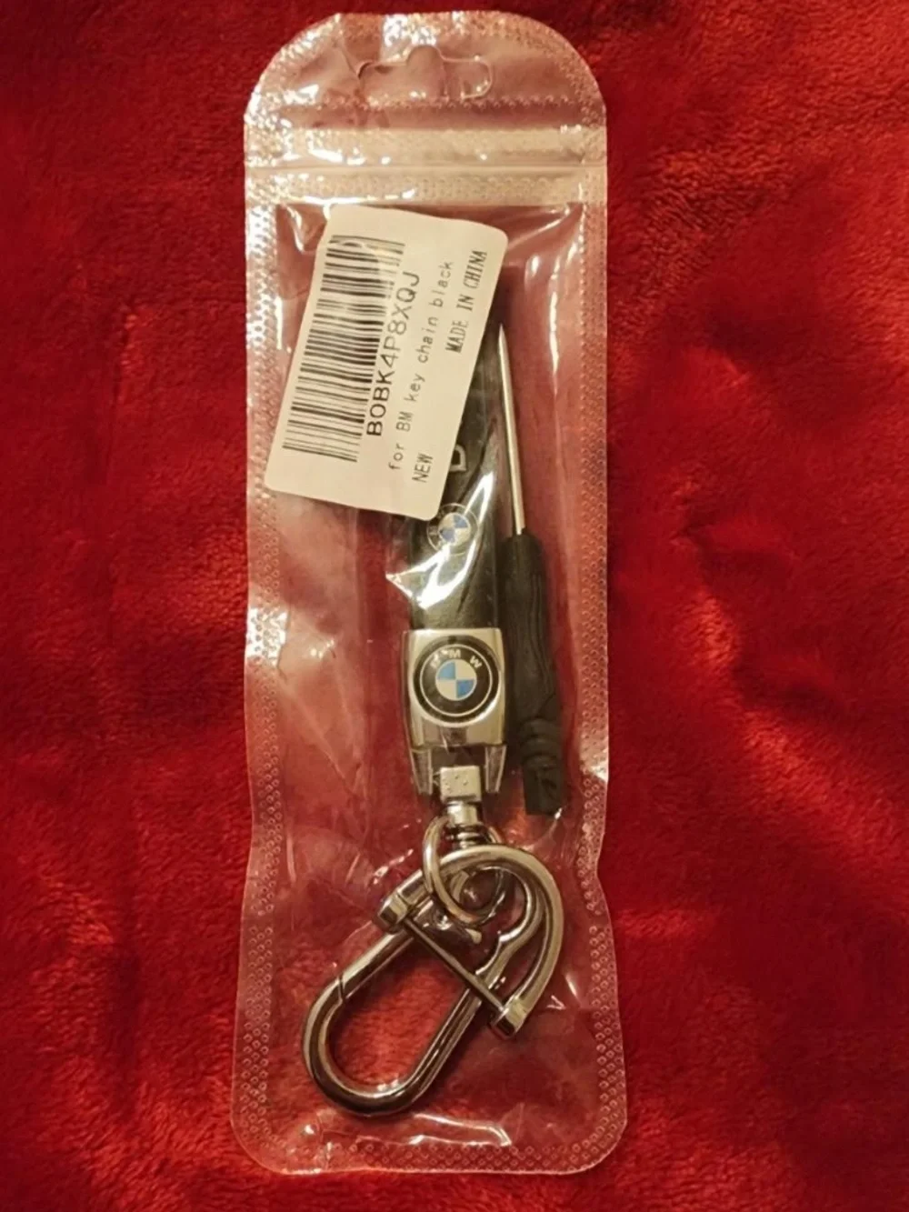 BMW-branded leather and zinc alloy car keychain